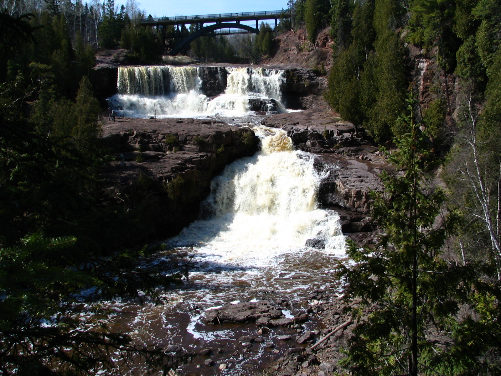 Lower Gooseberry Falls with a highway bridge in the background